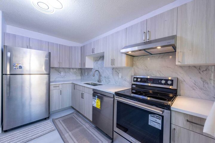 Property Photo:  3029 Rundleson Road NE 34  AB T1Y 3Z5 