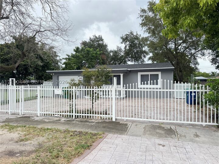 Property Photo:  2921 NW 94th St 2921  FL 33147 