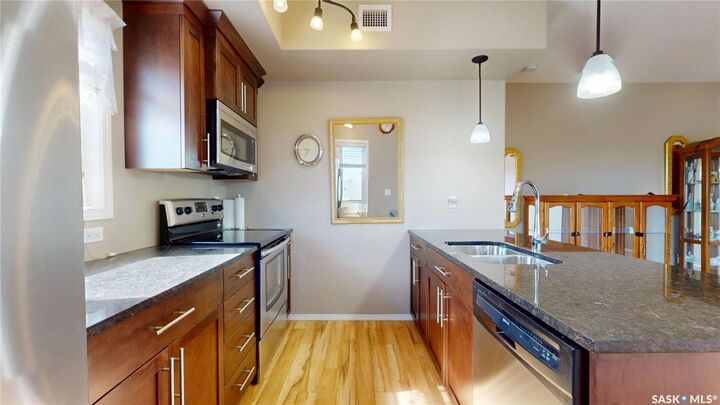 Property Photo:  1220 Blackfoot Drive 415  SK S4S 6T2 
