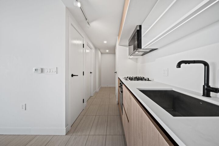 Property Photo:  5058 Joyce Street 2504  BC V5R 0J9 