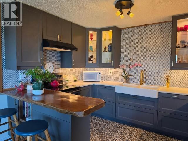 Property Photo:  6-4420 Quebec Ave  BC V8A 3G6 