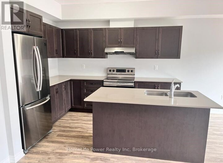 Property Photo:  324 Equestrian Way 40  ON N2E 2M6 