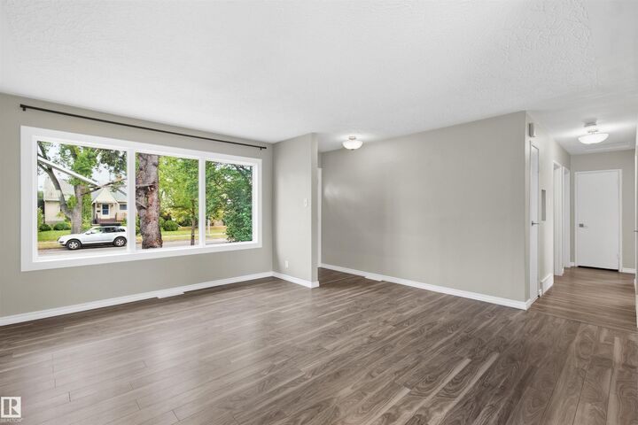 Property Photo:  7715 76 Avenue NW  AB T6C 0H3 
