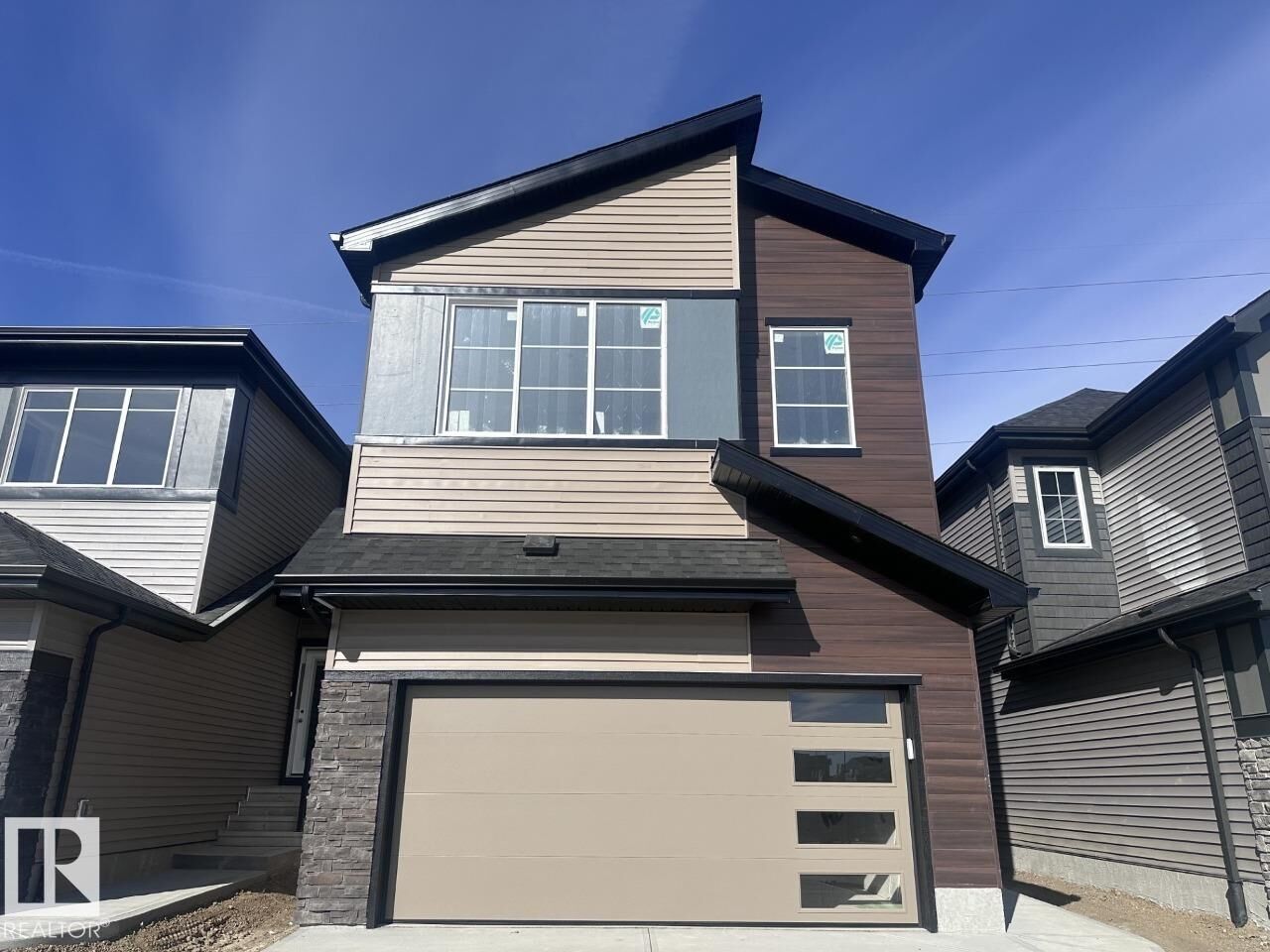 Property Photo: 17232 5 Street NW AB T5Y 6G4