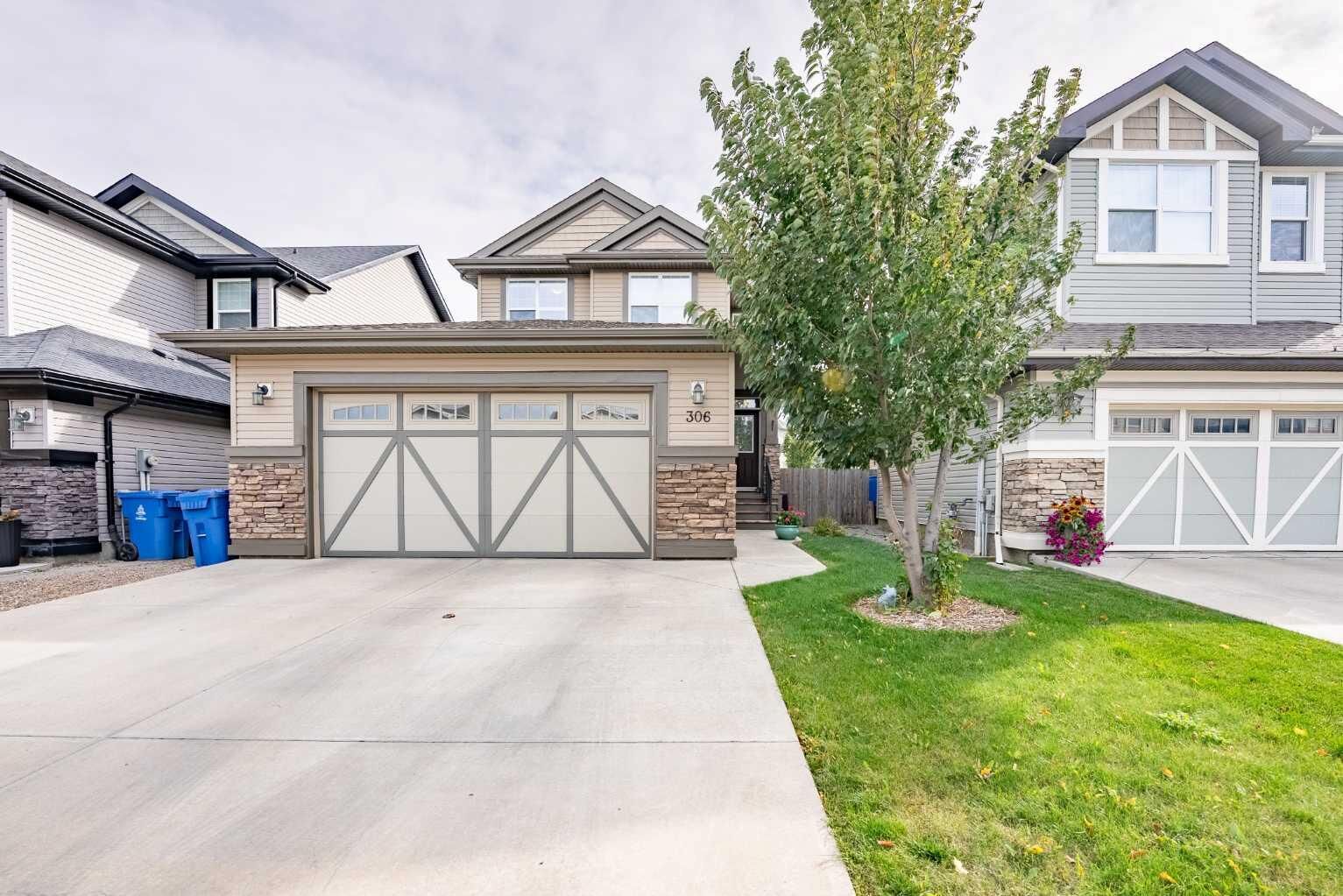 Property Photo:  306 Twinriver Road W  AB T1J 5B9 