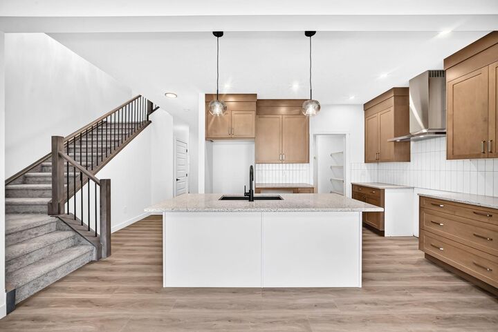 Property Photo:  1359 Bayview Crescent SW  AB T4B 5P1 