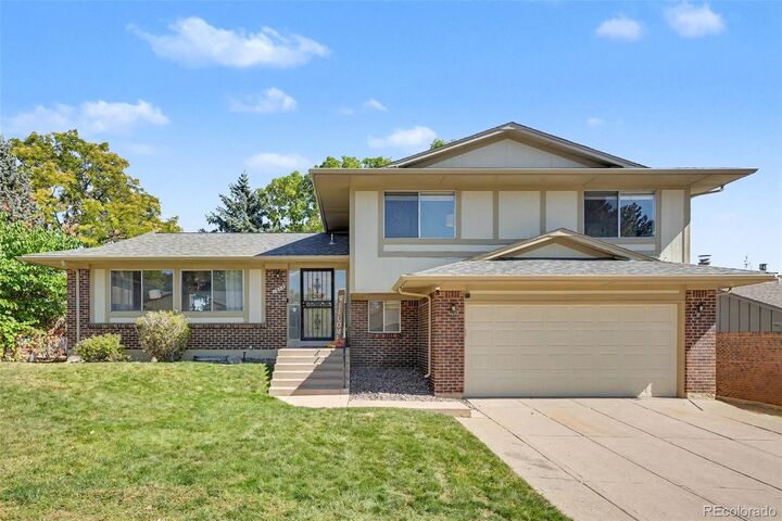 Property Photo:  1958 S Deframe Way  CO 80228 