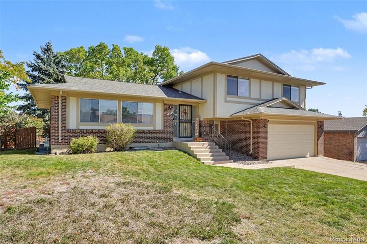 Property Photo:  1958 S Deframe Way  CO 80228 
