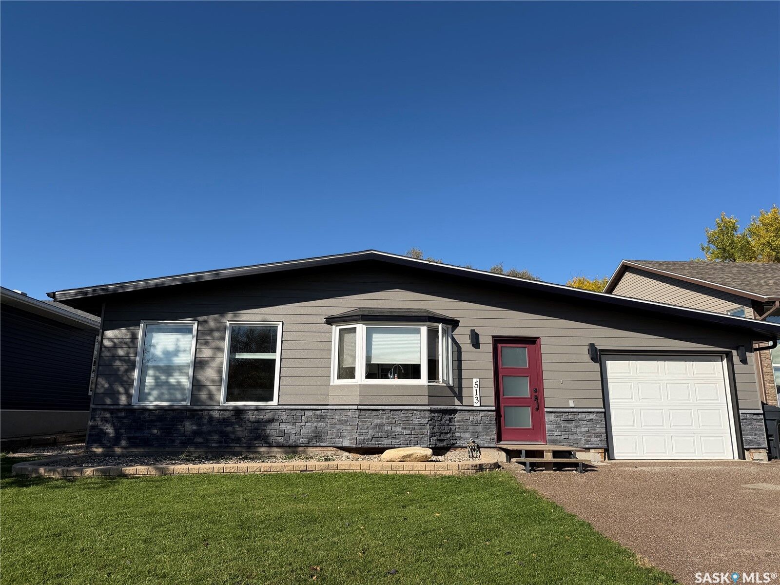 Property Photo:  513 Milne Crescent  SK S4A 2K7 