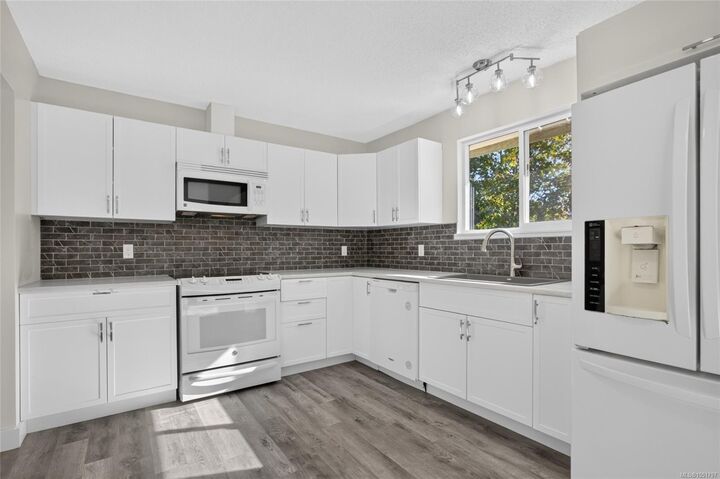 Property Photo:  1665 Dingwall Rd  BC V9N 3S8 