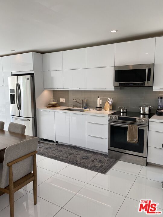 Property Photo:  23901 Civic Center Way, Unit 114  CA 90265 
