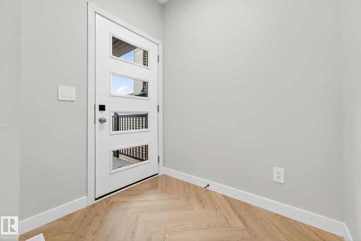 Property Photo:  8307 Kiriak Loop SW  AB T6W 5S2 