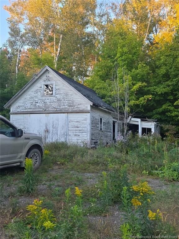 Property Photo:  65 Main Street  NB E6H 1L2 