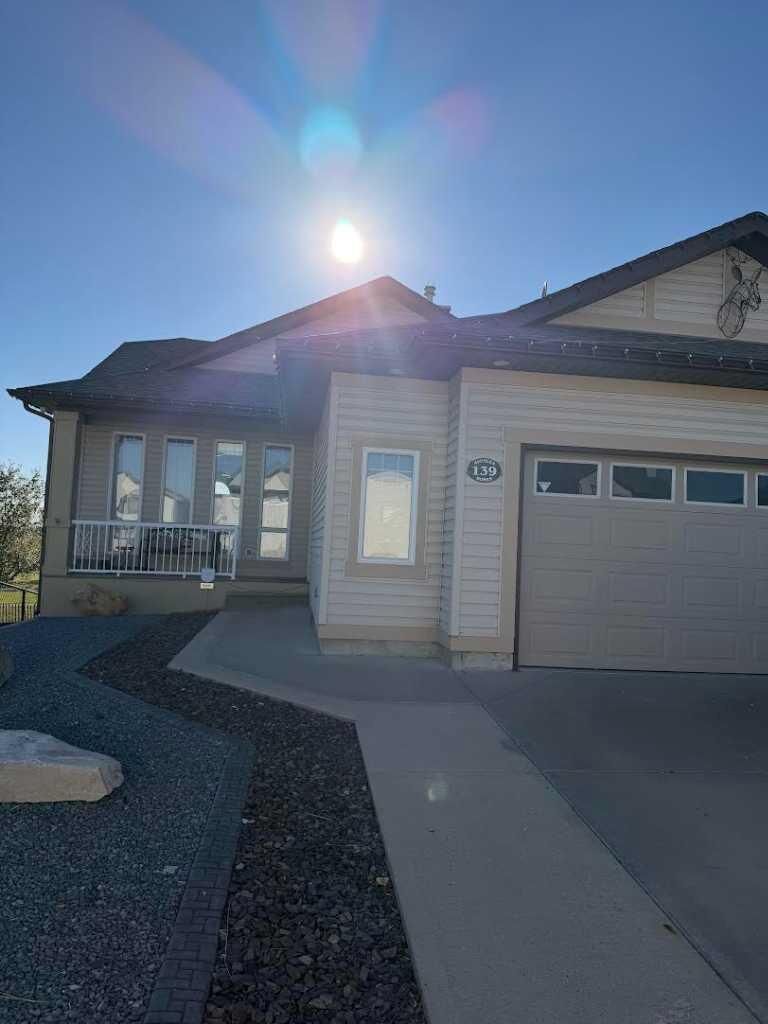 Property Photo:  139 Jessie Robinson Close N  AB T1H 6Y5 