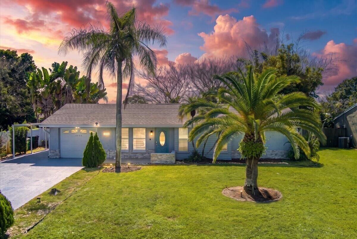 Property Photo: 2031 SE New York Street FL 34952