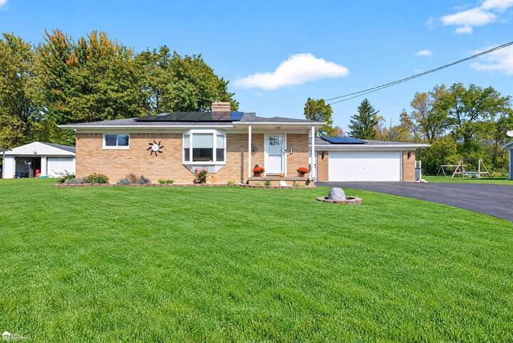 Property Photo: 6483 Bluejay Drive MI 48506