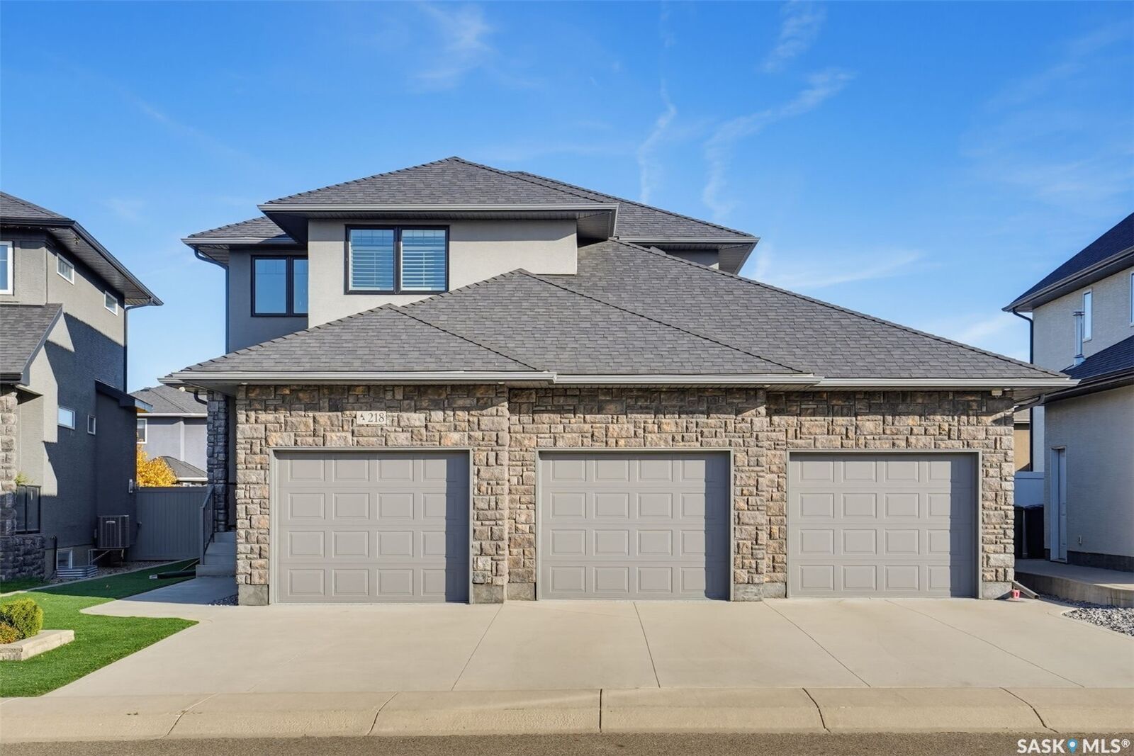 Property Photo:  218 Warder Cove  SK S7T 0P7 