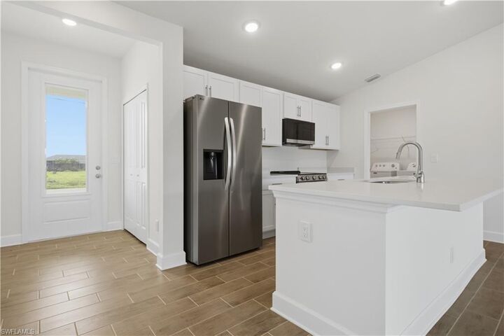 Property Photo: 1135 NW 8th Pl FL 33993
