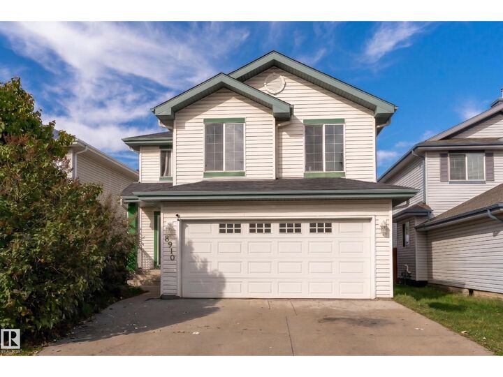 Property Photo:  8910 7 Av SW  AB T6X 1B9 