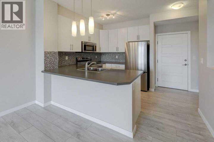 Property Photo:  207 Sunset Drive  AB T4C 0H7 