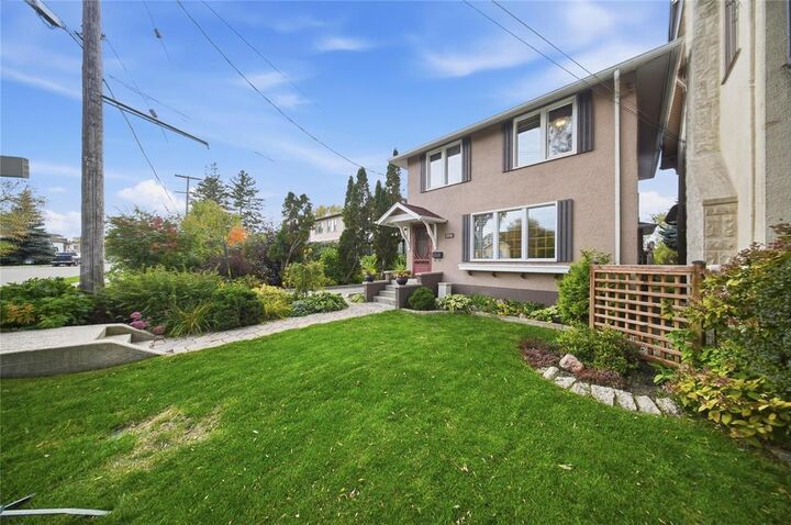 Property Photo: 208 Glenwood Crescent MB R2L 1J9