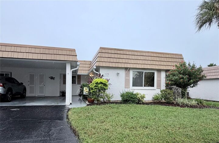 Property Photo:  2320 Aquabluff Place V274  FL 34231 
