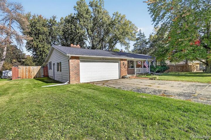 Property Photo:  9096 Carpenter Road  MI 48433 1012 