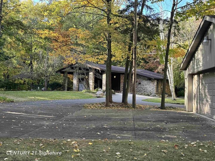 Property Photo:  936 W Cottage Grove Road  MI 48634 