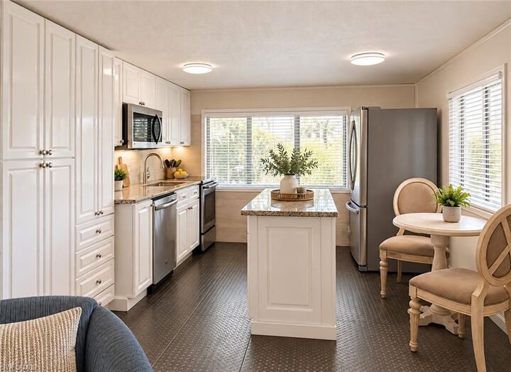 Property Photo: 1 Jacaranda Ct FL 34110
