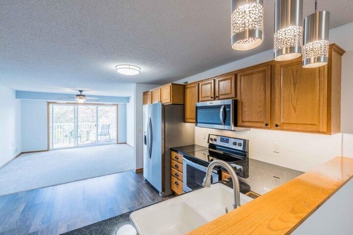 Property Photo: 16154 Main Avenue SE 212 MN 55372