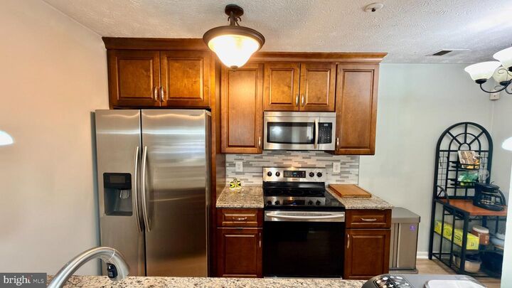 Property Photo:  4712 Dorsey Hall Drive 4-404  MD 21042 