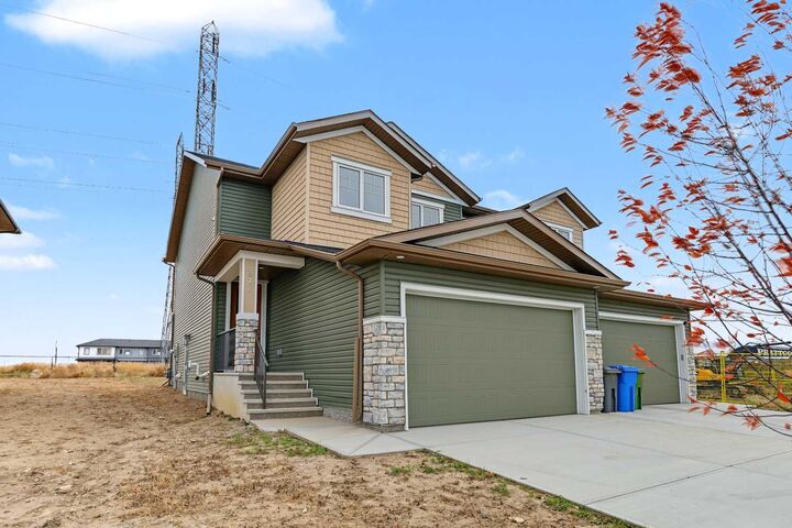 Property Photo:  311 Dawson Dock Way  AB T1X 2W4 