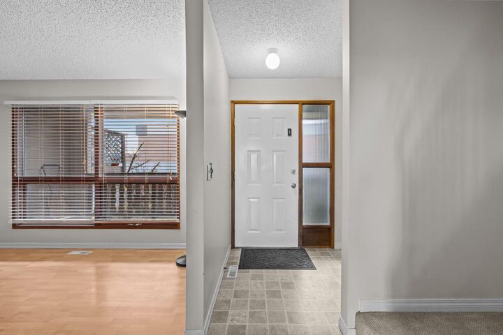 Property Photo:  130 Macewan Park Way NW  AB T3K 3E7 