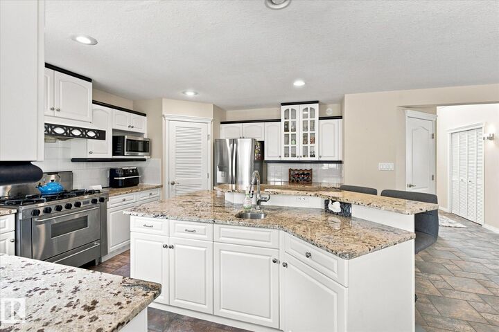 Property Photo:  1312 116 Street NW  AB T6J 7B3 
