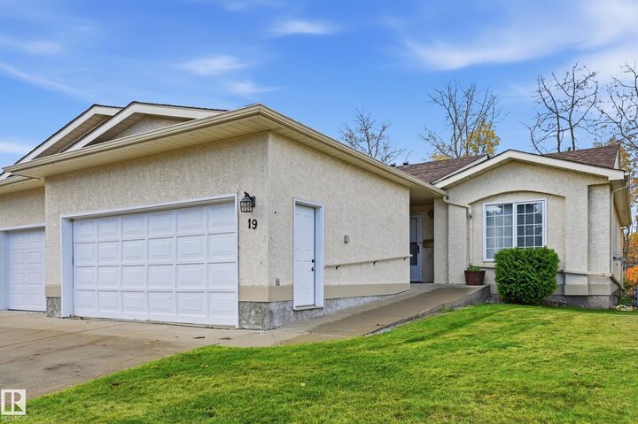 Property Photo:  10 Grange Drive 19  AB T8N 5Z2 