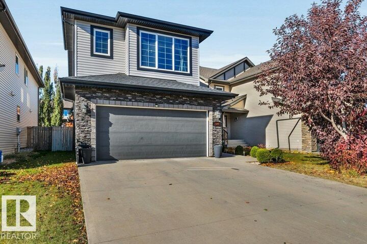 Property Photo:  1944 68 Street SW  AB T6X 0M2 