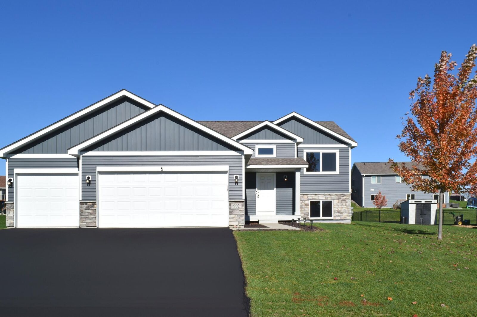 Property Photo:  902 Poplar Lane  MN 55388 