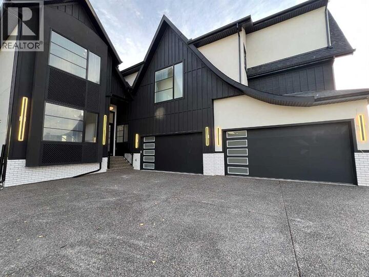 Property Photo:  16 Rockcliff Hill Northwest  AB T3G 0G6 