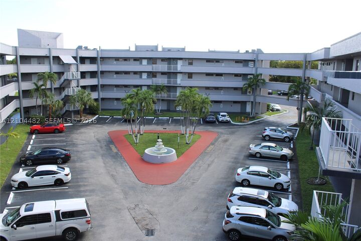 Property Photo:  18000 NW 68th Ave 409A  FL 33015 