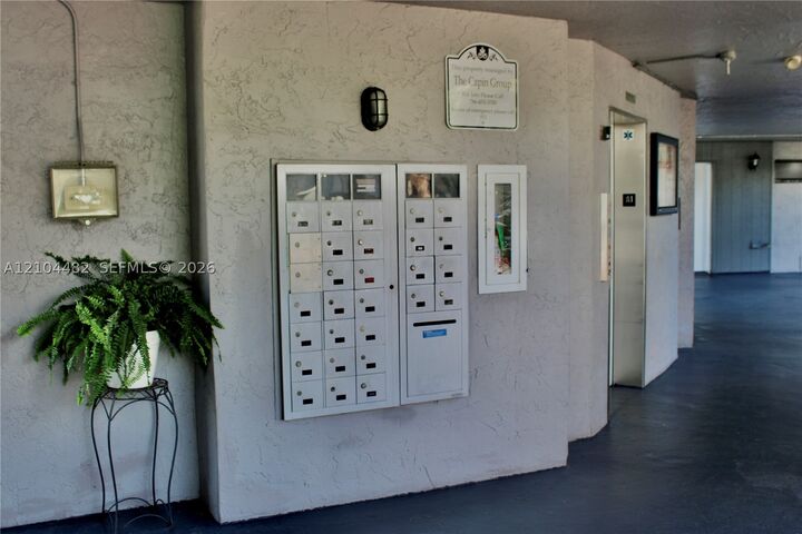 Property Photo: 18000 NW 68th Ave 409A FL 33015