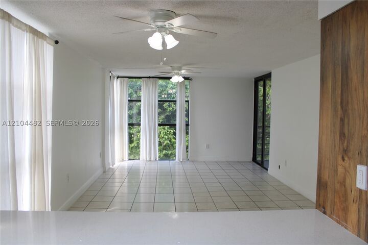 Property Photo:  18000 NW 68th Ave 409A  FL 33015 
