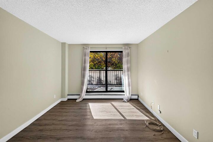 Property Photo:  835 19 Avenue SW 105  AB T2T 0H6 