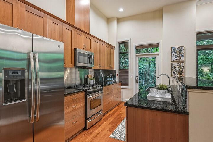 Property Photo:  15408  Main Street 102  WA 98012 