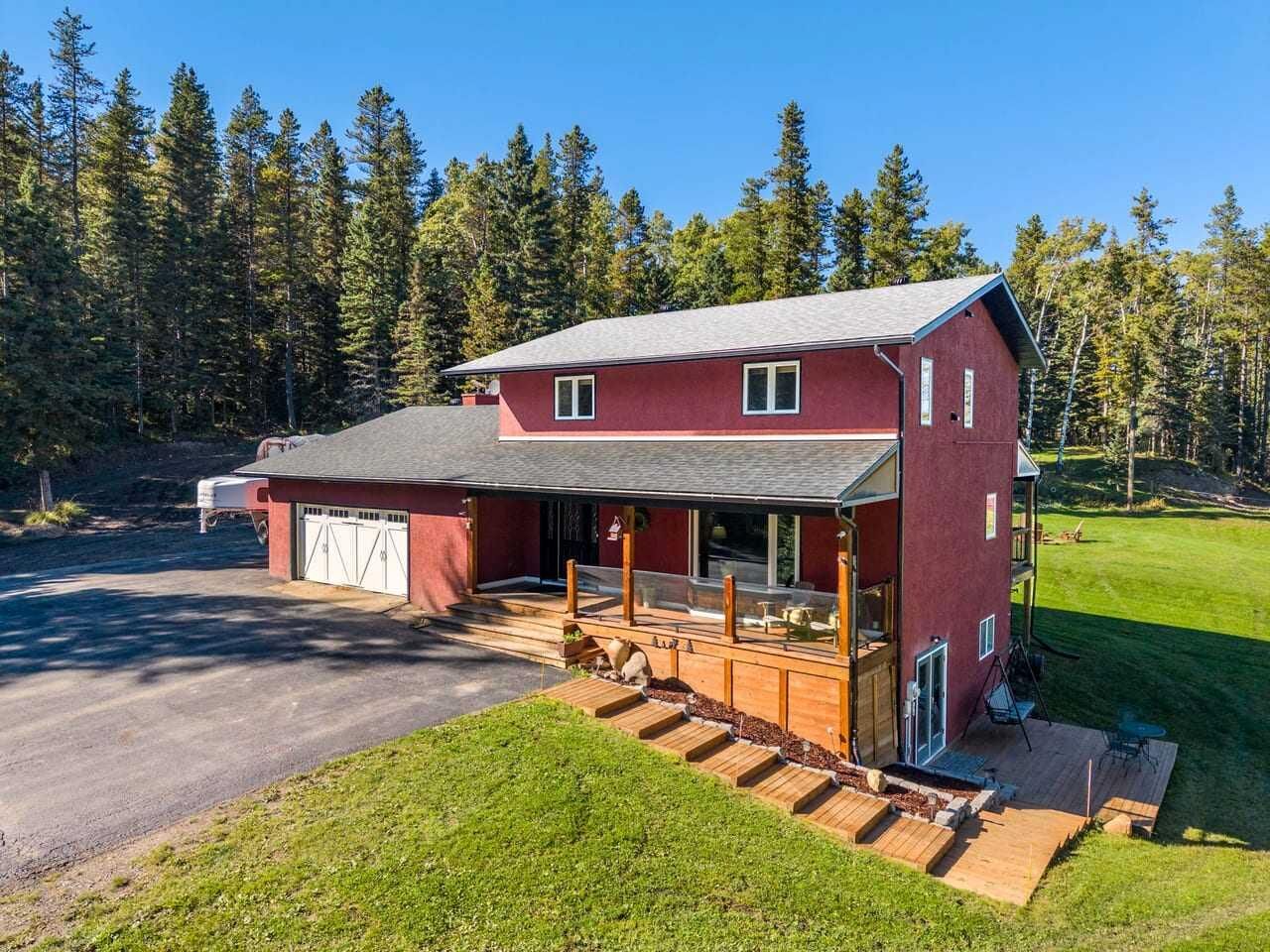 Property Photo:  352056 Pine Ridge Drive W  AB T0L 0K0 