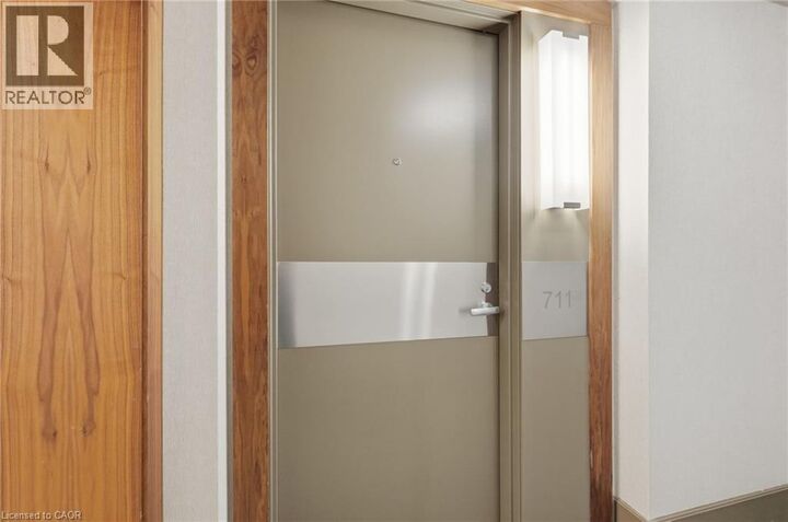 Property Photo: 3500 Lakeshore Road West 711 ON L6L 0B4