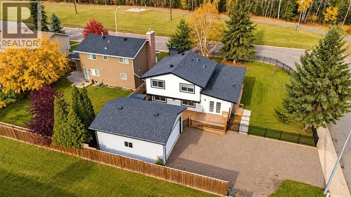 Property Photo: 169 Woodland Drive AB T9K 1A3