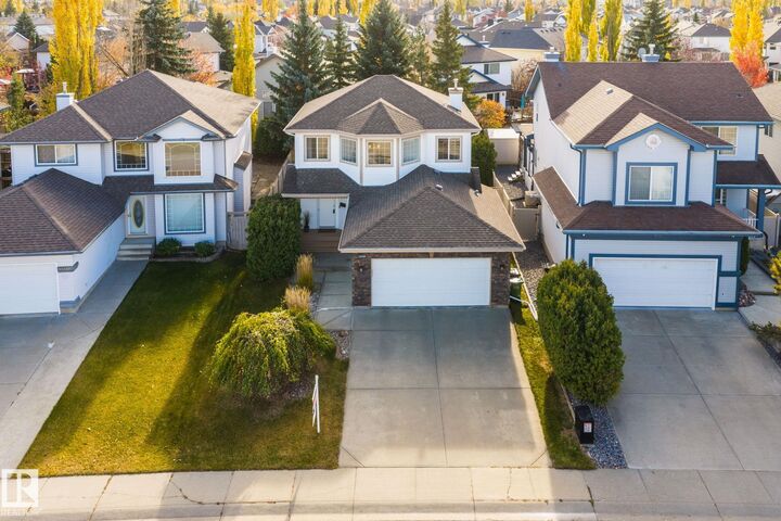 Property Photo:  11727 13 Avenue NW  AB T6J 7G1 