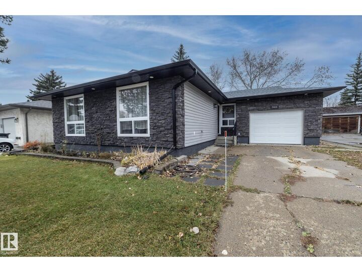 Property Photo:  7412 33 Av NW  AB T6K 1J4 