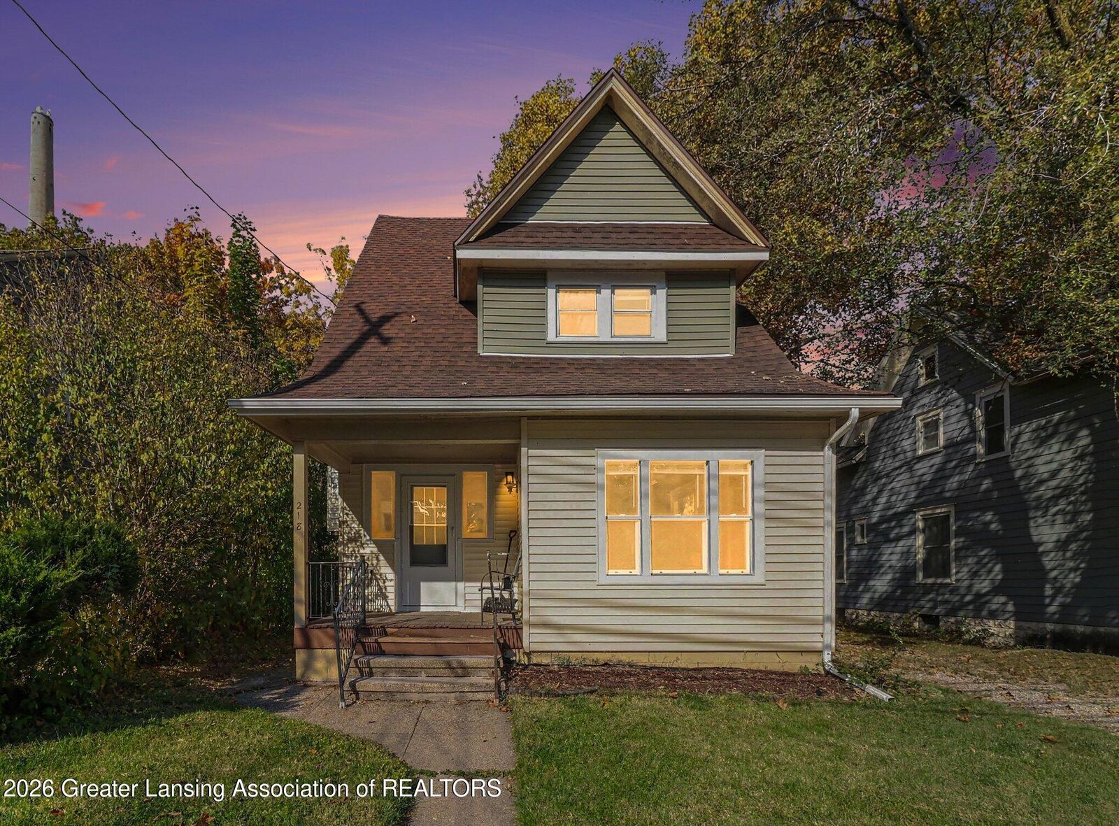 Property Photo: 218 Woodlawn Avenue MI 48910