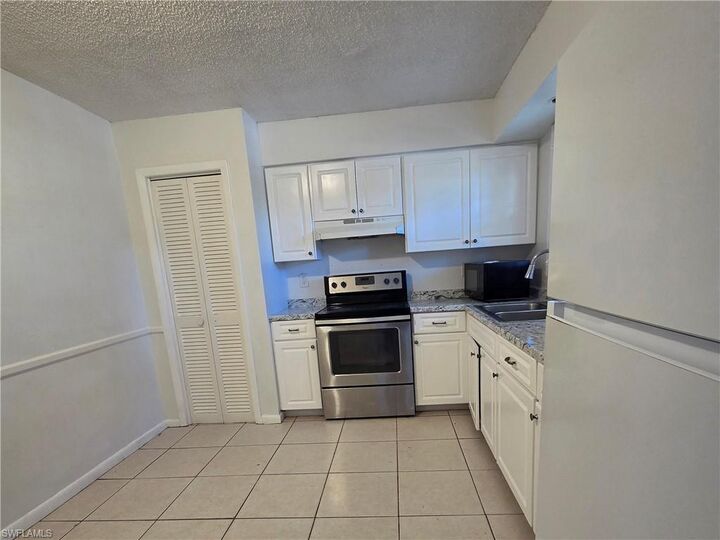 Property Photo:  3325 Airport Rd N G7  FL 34105 